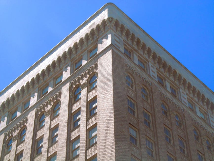 Corner view of a historic building showcasing intricate architectural details